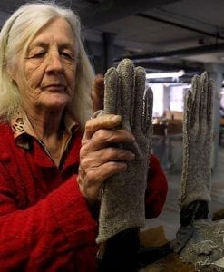Woman making gloves